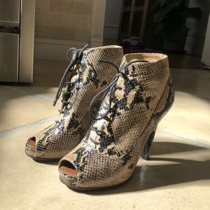 Proenza Schouler Snakeskin-effect booties.